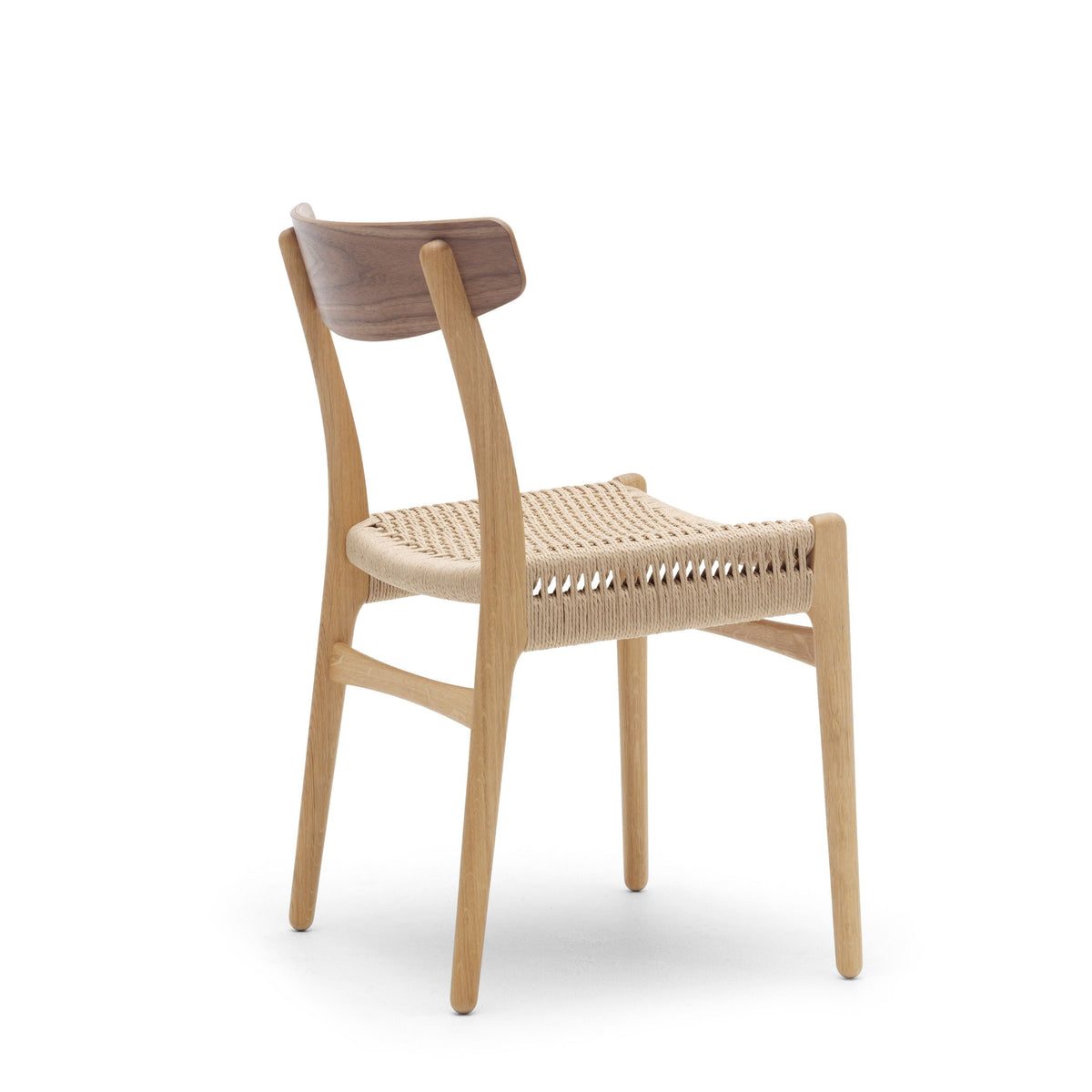 A modern wooden dining chair with a light natural oak frame, a curved backrest upholstered in dark brown fabric, and a woven seat, shown against a plain white background.