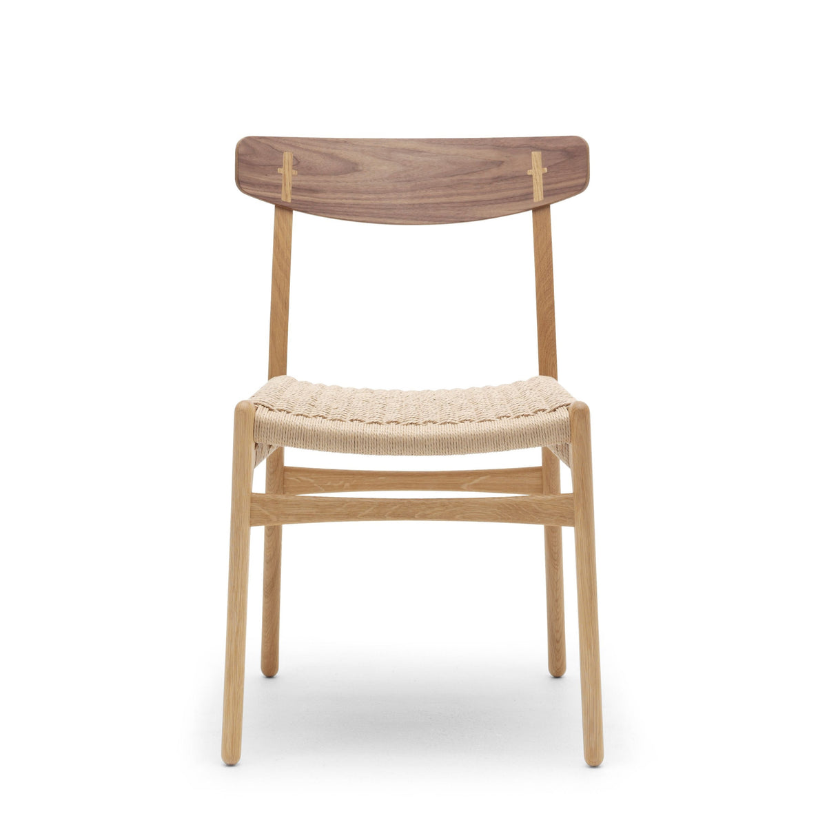 A modern wooden dining chair with a curved backrest, natural oak frame, and a woven beige rope seat, shown against a plain white background.