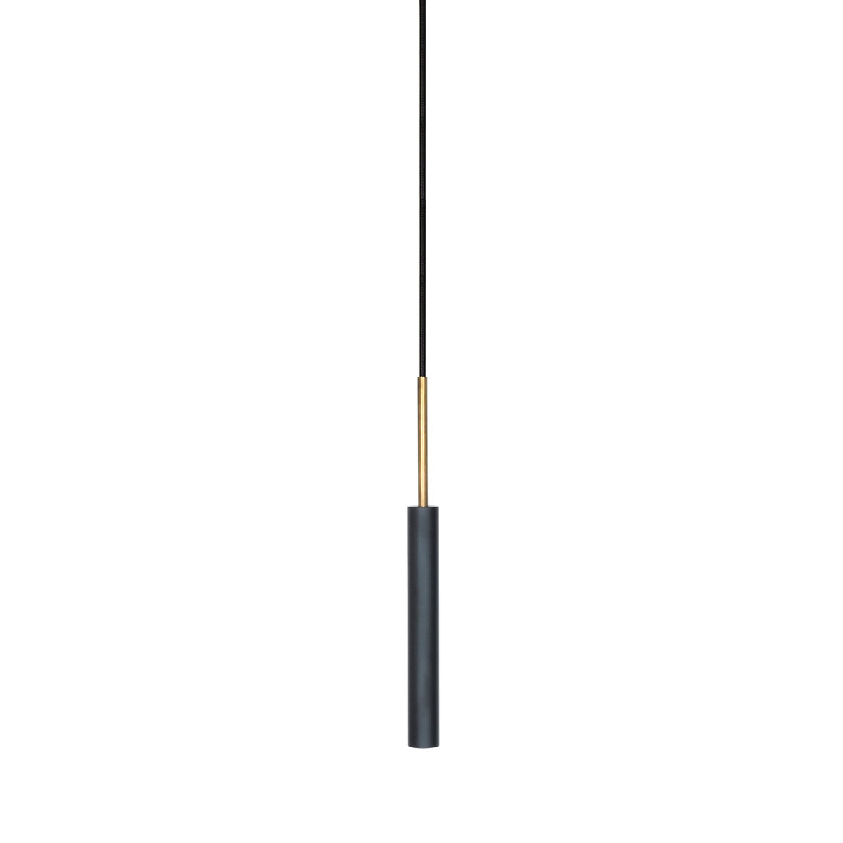A minimalist pendant light with a matte black cylindrical shade and a slim gold metal accent ring, suspended by a thin black cord against a solid white background.